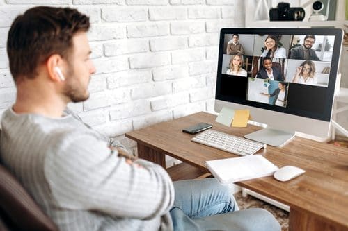 Man in a virtual meeting for online festival post