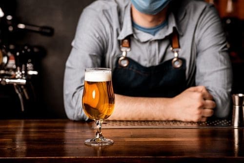 Brewer with beer for coronavirus post