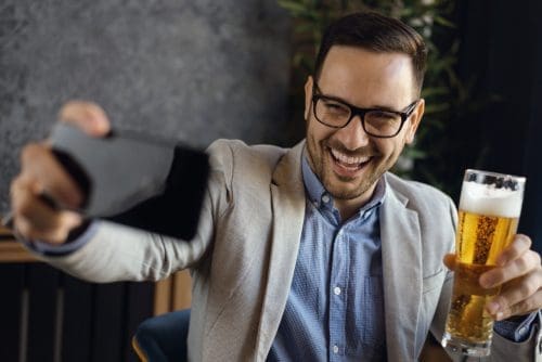 Influencer with a beer for coronavirus post