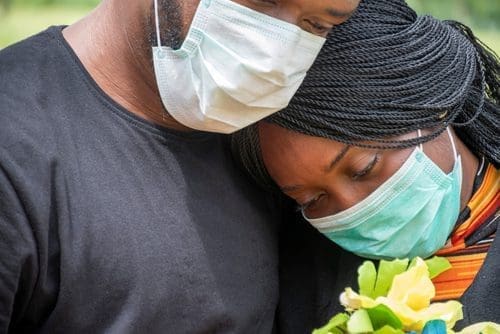 Grieving couple photo for communicate tragedy post