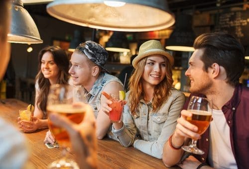 Friends enjoying a drink for funding sources post