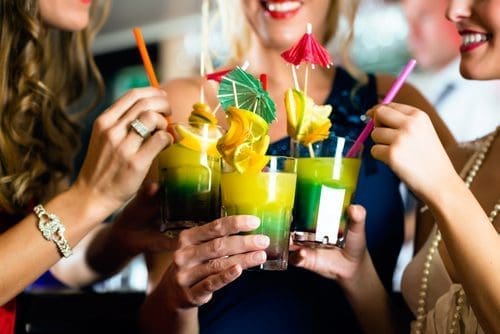 Women cheersing photo for non-creepy birthdays post