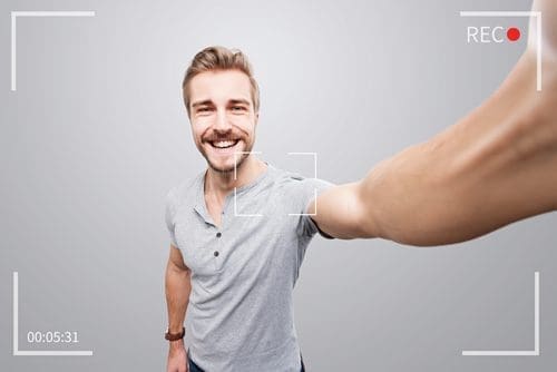 Man livestreaming photo for marketing refresh post